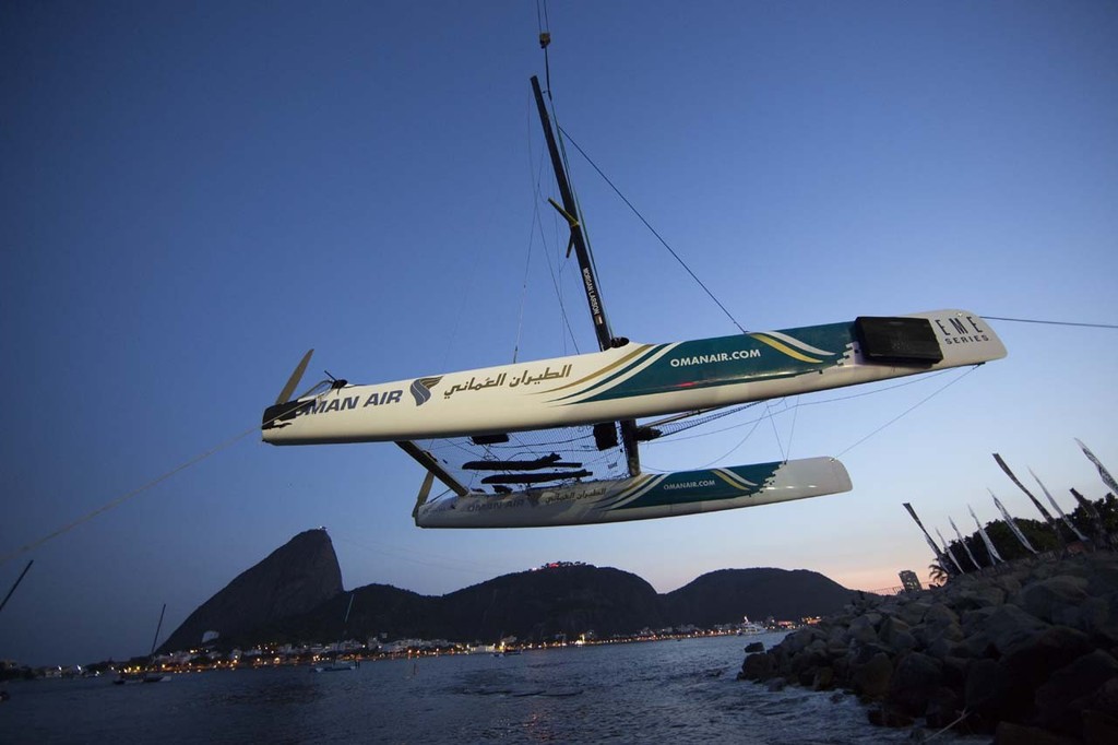 Oman Air is craned out for over-night repairs after a collision with Red Bull Sailing Team on day 1 in Rio - 2012 Extreme Sailing Series - Act 8 Rio © Lloyd Images http://lloydimagesgallery.photoshelter.com/
