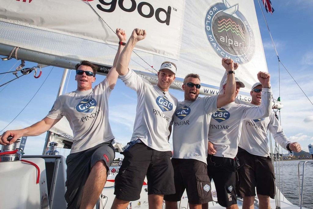 Ian Williams and his GAC Pindar Team celebrate after winning the Alpari World Match Racing Tour at the 2012 Monsoon Cup. © Gareth Cooke - Subzero Images http://www.subzeroimages.com
