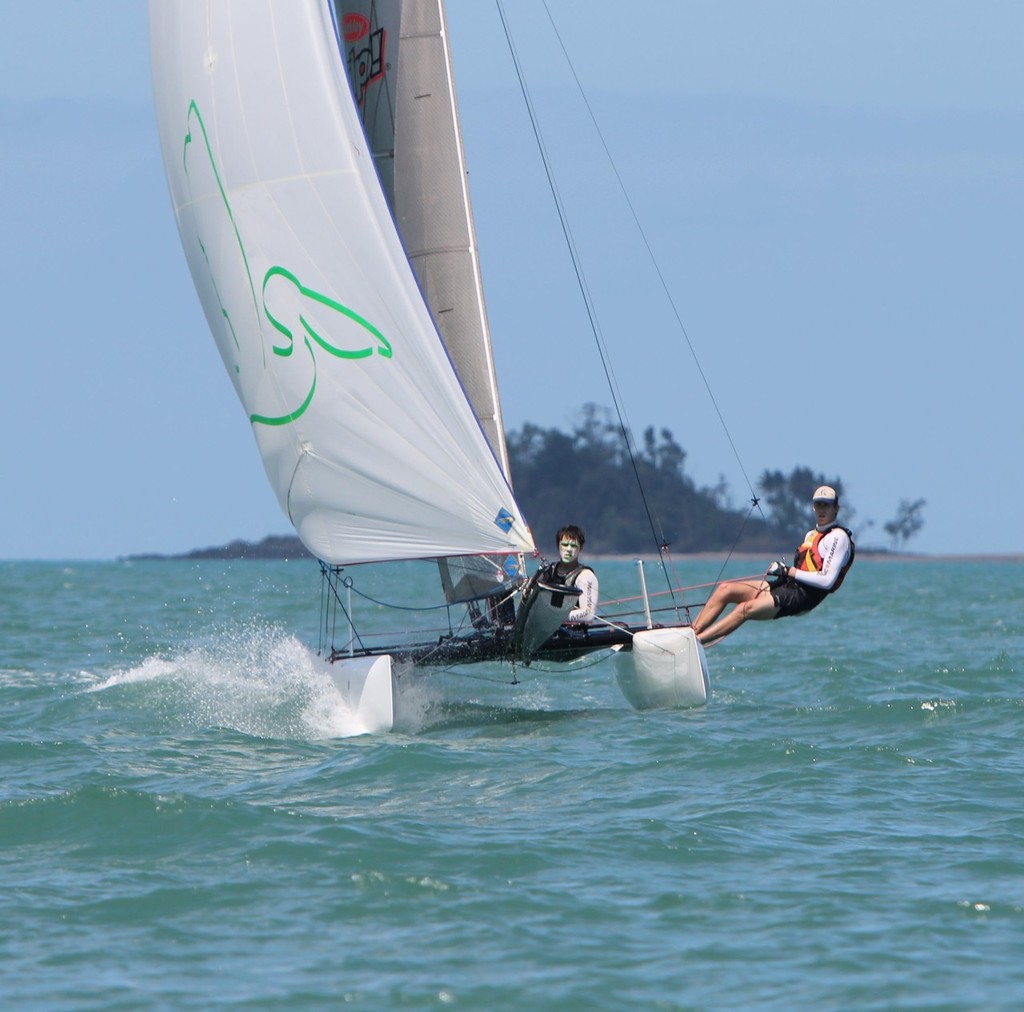 Jamie Leitner and Matt Webb sail the F18 ``Boys on the Water`` with Portaboi Island in the back ground - Zhik Mission Beach Regatta photo copyright Tom Orr taken at  and featuring the  class