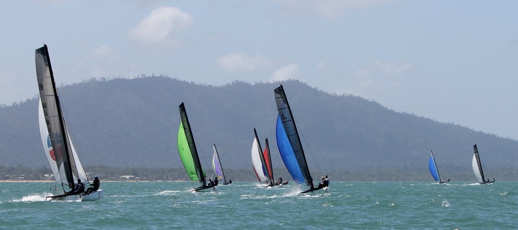 Part of the F18 fleet with Clump Mountain in the back ground - Zhik Mission Beach Regatta © Tom Orr