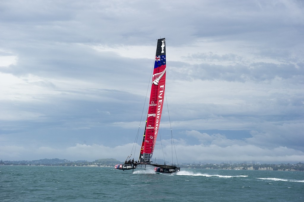 Emirates Team New Zealand training with  the team’s first AC72 on the Hauraki Gulf, heading towards the Auckland storm. © Chris Cameron/ETNZ http://www.chriscameron.co.nz
