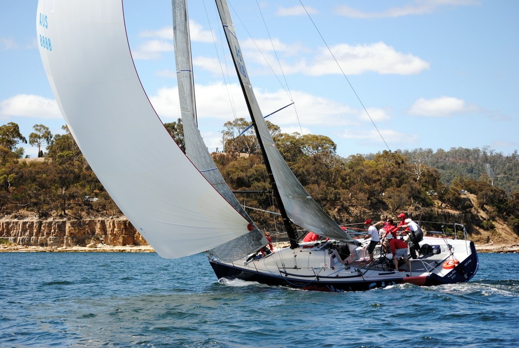 King of the Derwent winner Voodoo Chile reaching under spinnaker off Kangaroo Bluff today - Porsche King of the Derwent 2012 photo copyright Rob Cruse taken at  and featuring the  class