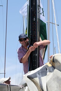 Loading the mainsail into her cars on Dekadence. - Rolex Sydney Hobart Yacht Race photo copyright  Alex McKinnon Photography http://www.alexmckinnonphotography.com taken at  and featuring the  class