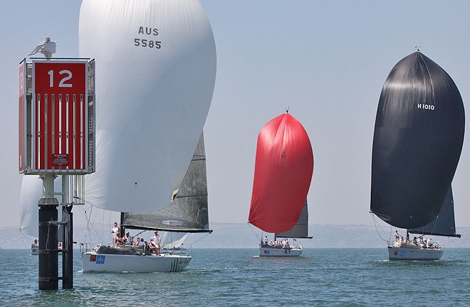 Division Two leaders come back down the Corio Bay course under kite. - Audi IRC Australian Championships ©  John Curnow