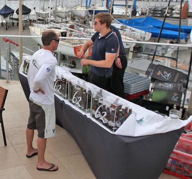 The first sailor to get one of the sponsor’s new 62 Pilsners. - TP52 Southern Cross Cup ©  John Curnow