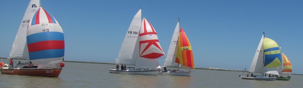 Fast racing (spinnaker) division work their way downstream in the 2012 Milang-Goolwa Freshwater Classic - The Marina Hindmarsh Island Milang-Goolwa Freshwater Classic photo copyright Louise Edwards taken at  and featuring the  class