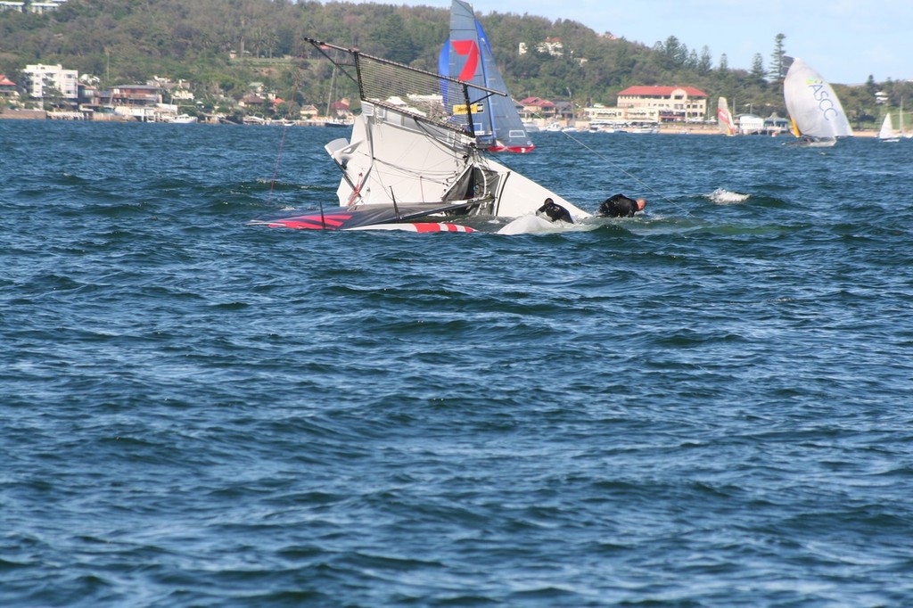 Yamaha seconds after nose diving, which sent the crew around the forestay, during Heat 2. photo copyright Lyn Holland taken at  and featuring the  class