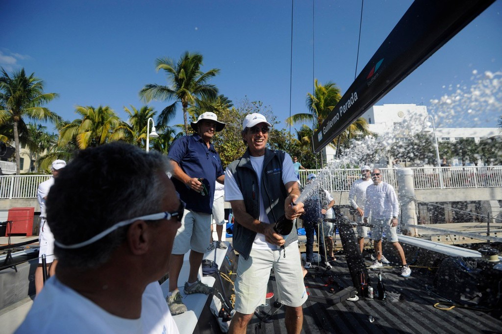 Azzurra celebrate 2013 52 Super Series victory at Quantum Key West photo copyright Xaume Olleros / 52 Super Series taken at  and featuring the  class