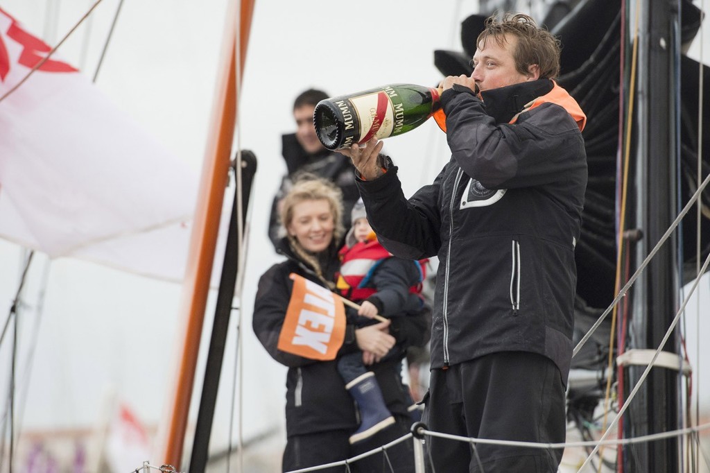SAILING - VENDEE GLOBE 2012/2013 - LES SABLES D'OLONNE (FRA) - 30/01/13 - PHOTO VINCENT CURUTCHET / DPPI - VENDEE GLOBE FINISH FOR ALEX THOMSON (GBR) / HUGO BOSS AFTER 80D 19H 23MN 43SEC / 3rd FOR PODIUM WITH OSCAR (2YO) AND HIS WIFE KATE photo copyright Vincent Curutchet / DPPI / Vendée Globe  taken at  and featuring the  class