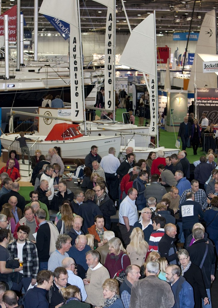 Crowds enjoy a pint on the Guinness stand at the Tullett Prebon London Boat Show, ExCeL, London. © onEdition http://www.onEdition.com