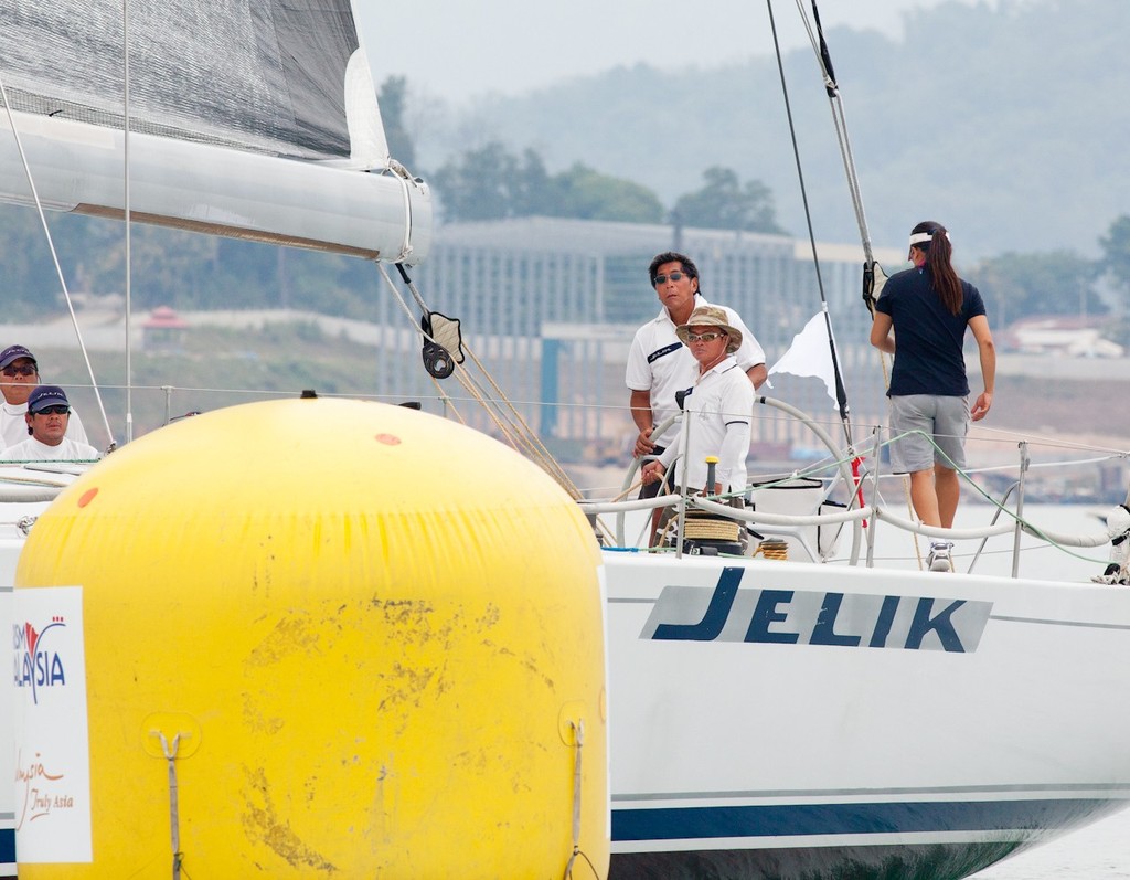 Royal Langkawi International Regatta 2013. Jelik takes a good look at the mark. photo copyright Guy Nowell http://www.guynowell.com taken at  and featuring the  class