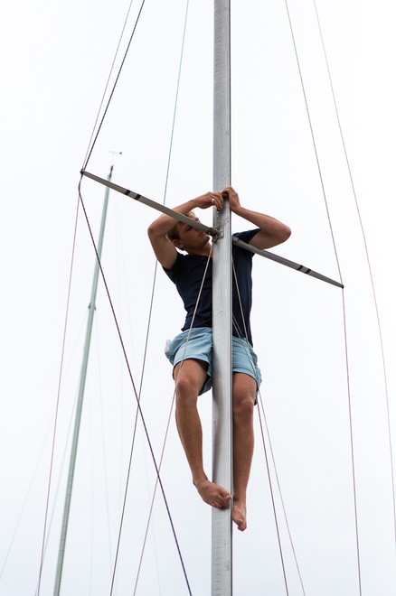 Jacob Broom performs some last minute tuning tasks on the mast. - 2013 Etchells NSW Championship © Kylie Wilson Positive Image