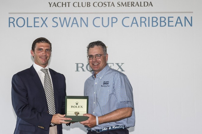 Prize Giving at the YCCS green.<br />
Alex Tabary, General Manager Rolex Caribbean with James C. Madden, Owner of Stark Raving Mad -  Rolex Swan Cup Caribbean 2013 ©  Rolex / Carlo Borlenghi http://www.carloborlenghi.net