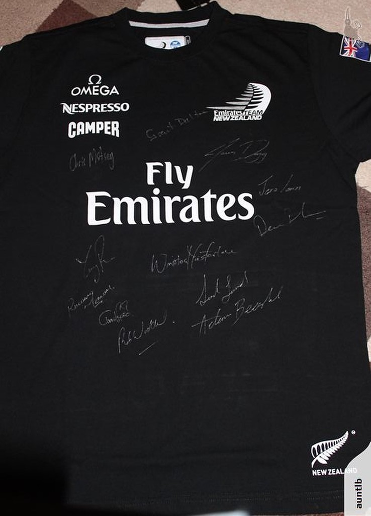 Front view - Emirates Team NZ signed shirt - proceeds to cancer charity photo copyright SW taken at  and featuring the  class