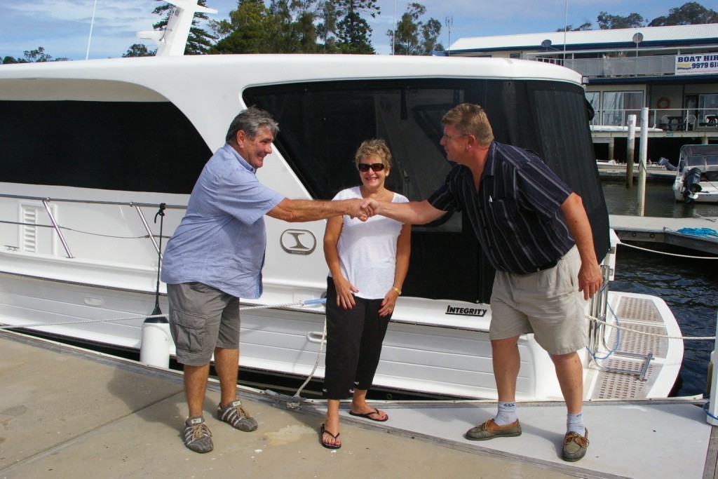 Integrity Motor Yachts 380 Sedan handover with Richard and Lee Surgeon photo copyright Creating Demand taken at  and featuring the  class