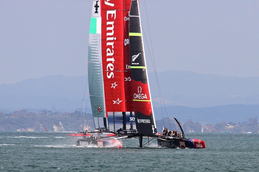 Emirates Team NZ accelerates to get away from Luna Rossa in the prestart  - AC72 Race Practice - Takapuna March 8, 2013 photo copyright Richard Gladwell www.photosport.co.nz taken at  and featuring the  class