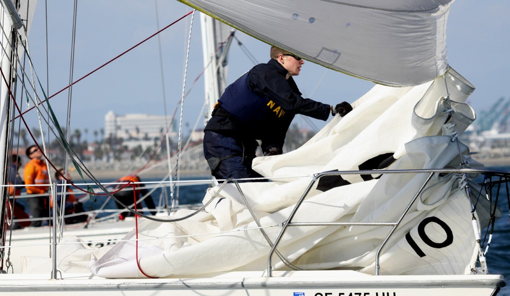 2013 Port of Los Angeles Harbor Cup - Navy douses its jib after raising the spinnaker to go downwind  © Rich Roberts / photo boat captain Mike Learned .