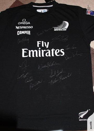 Front view - Emirates Team NZ signed shirt - proceeds to cancer charity © SW