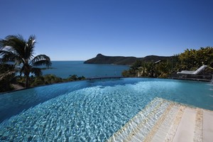 Enjoy relaxing in the stunning infinity edge pool at The Glasshouse! What a view... photo copyright Kristie Kaighin http://www.whitsundayholidays.com.au taken at  and featuring the  class