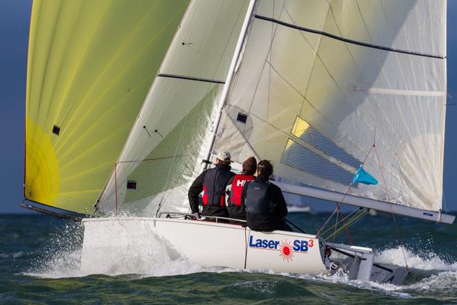 The Laser SB20 pass the Needles today at the J.P. Morgan Asset Management Round the Island Race. © onEdition http://www.onEdition.com