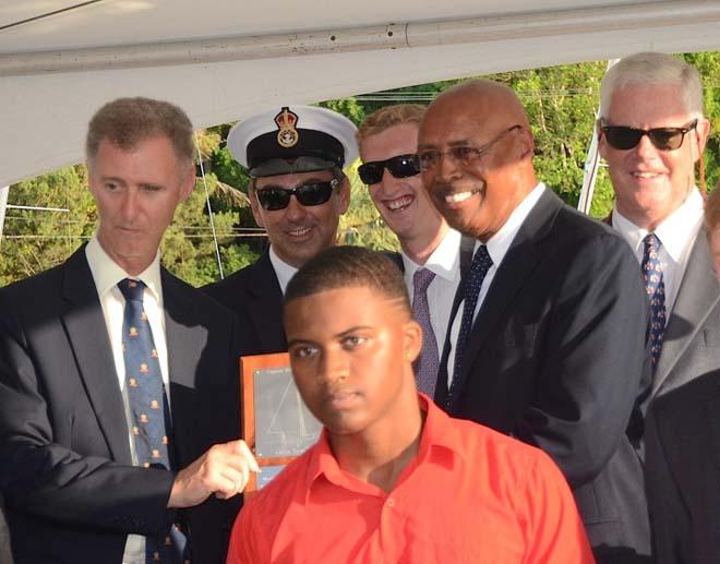 His Excellency the Governor of Bermuda, Mr. George Fergusson, presented the Captain Ed Williams Trophy to Ed Williams, Jr who had sailed in the Marion Bermuda Race aboard the Spirit of Bermuda. The skipper, Preston Hutchings, asked that the inaugural prize for the first yacht on corrected time in the new Classic Yacht Division be presented to Williams in memory of his father Ed Sr. © Talbot Wilson