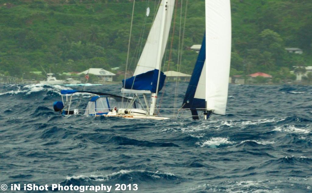 Catalina 380 ``sinking`` in the strong winds and large swell in TPR X - Tahiti Pearl Regatta 10th Edition - Photography from iN iShot photo copyright Morgan Rogers taken at  and featuring the  class