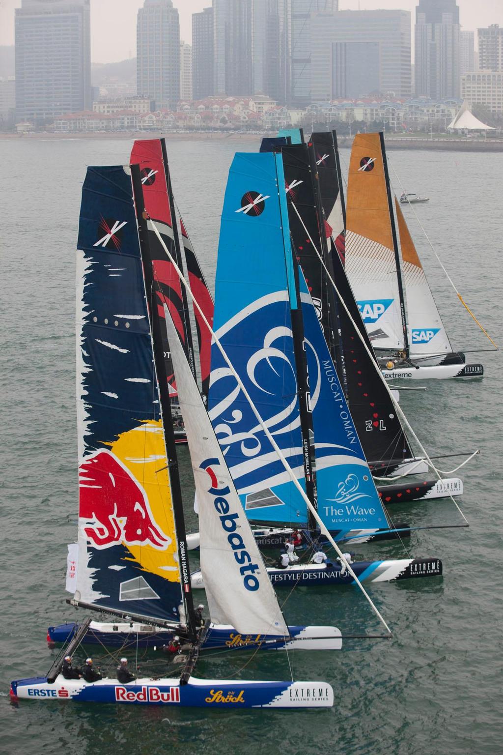 Extreme-40 lined up on the start line for the final race of Act 2, Qingdao 2012. Extreme Sailing Series photo copyright Lloyd Images http://lloydimagesgallery.photoshelter.com/ taken at  and featuring the  class