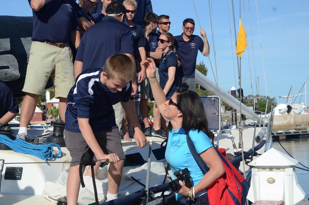 Sonia Riley moves in with a congratulatory kiss for her son Jo after he completed his first Marion Bermuda Race on Shindig.
 photo copyright Talbot Wilson taken at  and featuring the  class