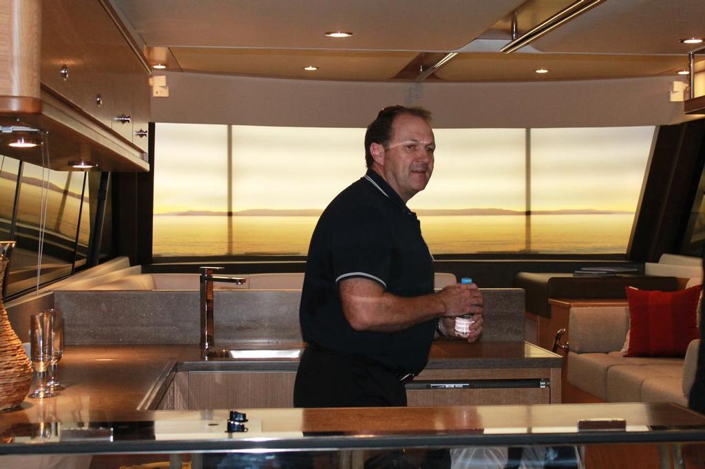 Wes seems comfortable in the galley of the new model photo copyright Jeni Bone taken at  and featuring the  class