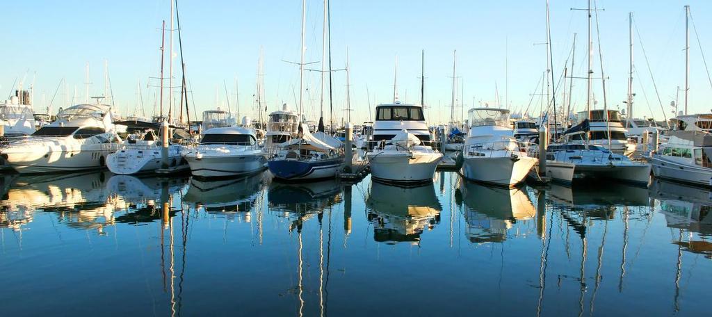 Expensive yachts and boats lined up at the marina at daybreak. photo copyright SW taken at  and featuring the  class