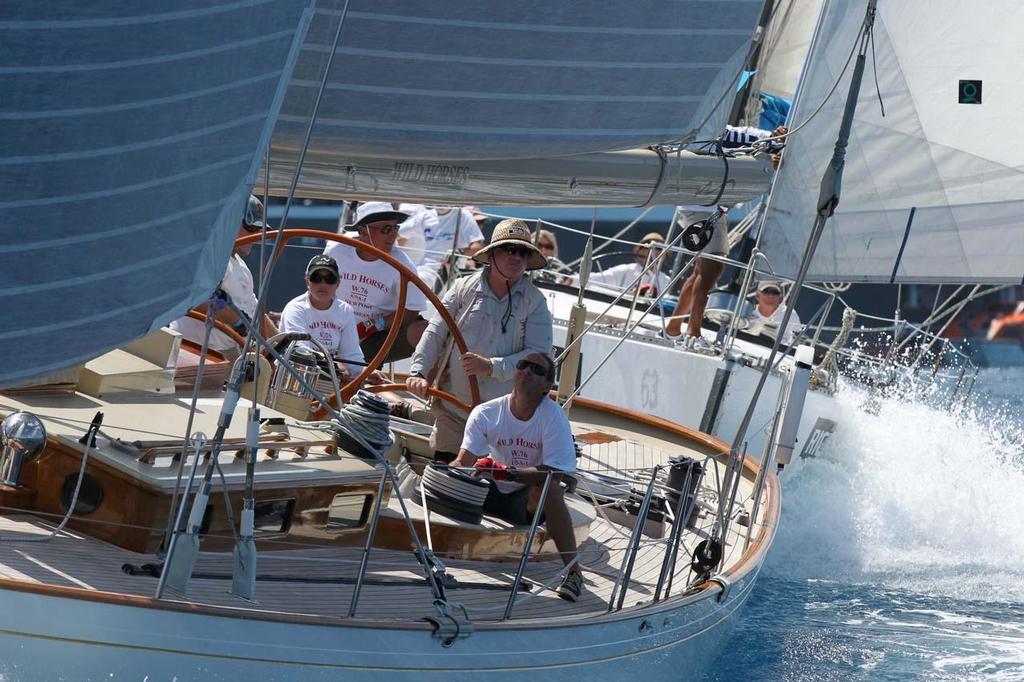 Les Voiles de Saint Barth 2013 - Donal Tofias at the helm of Wild Horses on Day 2 photo copyright  Tim Wright / Les Voiles de St Barth http://www.lesvoilesdesaintbarth.com/ taken at  and featuring the  class