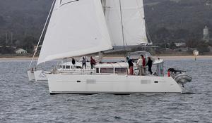 Right down to the wire with SKI and Nandoq to windward. - 2013 Lagoon Escapade photo copyright  John Curnow taken at  and featuring the  class