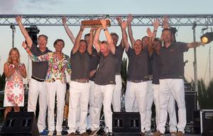 Superyacht Cup 2013 - Crew of Heartbeat collecting the Big Bent Cleat Trophy photo copyright Claire Matches http://www.clairematches.com taken at  and featuring the  class