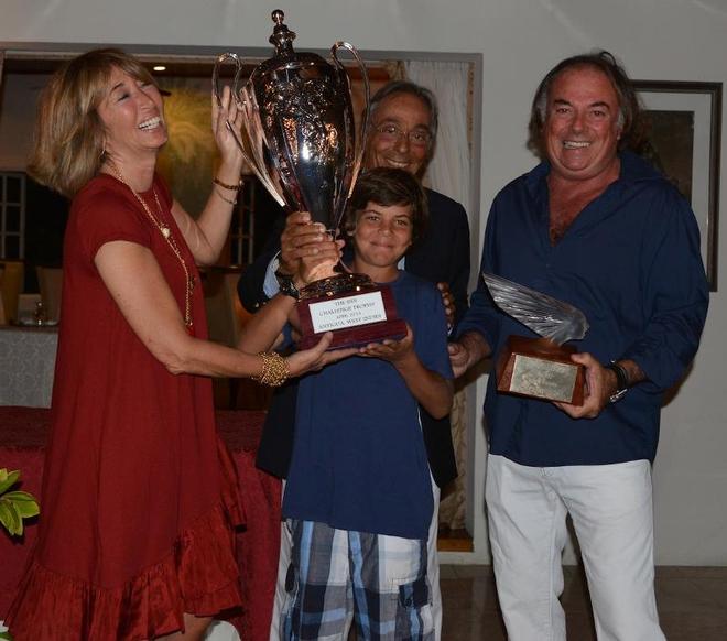 Victory for Mariella. Susanna and Enzo Addari, owners of The Inn at English Harbour present young Rocco Falcone with The Inn Challenge Trophy and Carlo Falcone holds the exquisite Lalique Victoire figurehead keepsake for winning the first edition of the regatta in Antigua - The inn challenge trophy © J Rainey
