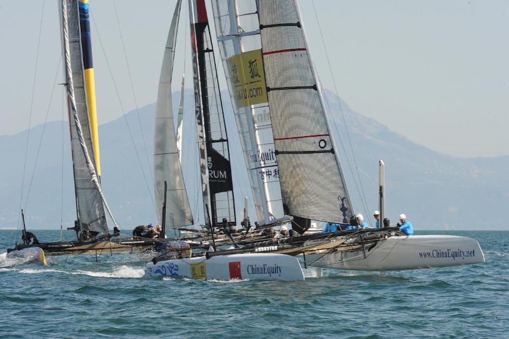 China Team is ahead of HS Racing  going into the windward gate and places 8th in the second race but is still tied for last with HS Racing at the ACWS in Naples Italy on April 18, 2013. photo copyright  SW taken at  and featuring the  class