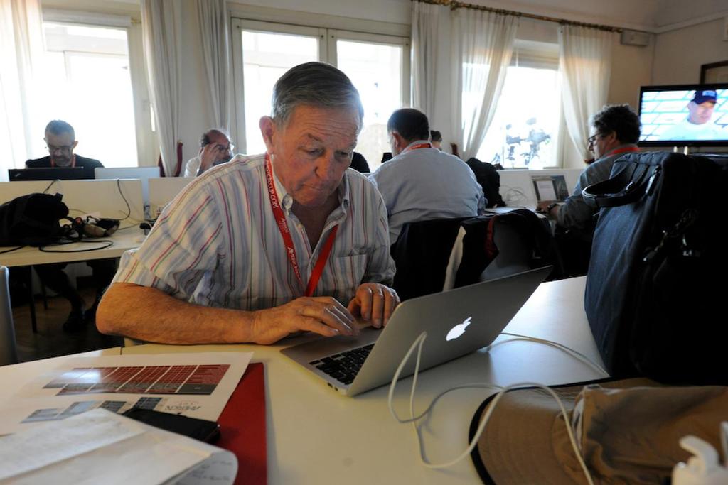 Bob Fisher working at the Media Center at the ACWS in Naples Italy April 18, 2013 on the first day of racing. photo copyright  SW taken at  and featuring the  class