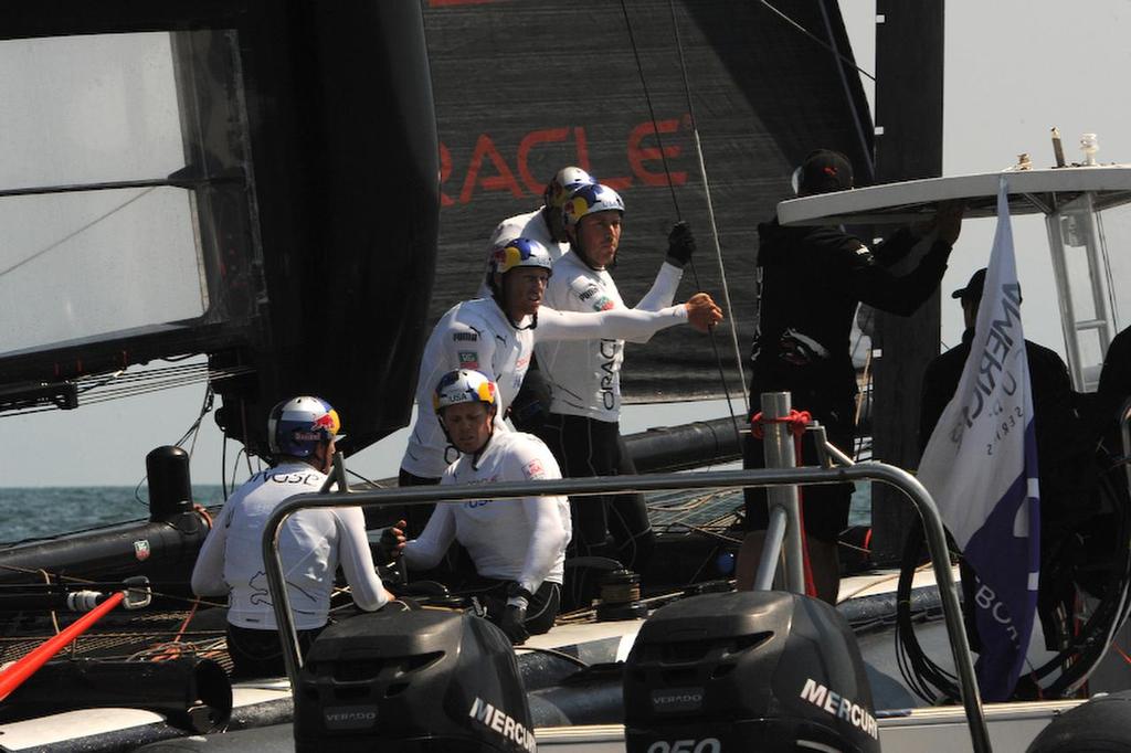 Oracle Team USA gets a last minute briefing before racing starts on April 19, 2013 and ends up first in the overall standings at the ACWS in Naples Italy. ©  SW