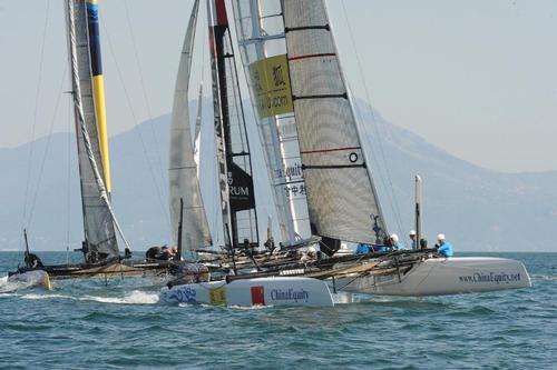 China Team is ahead of HS Racing  going into the windward gate and places 8th in the second race but is still tied for last with HS Racing at the ACWS in Naples Italy on April 18, 2013. ©  SW
