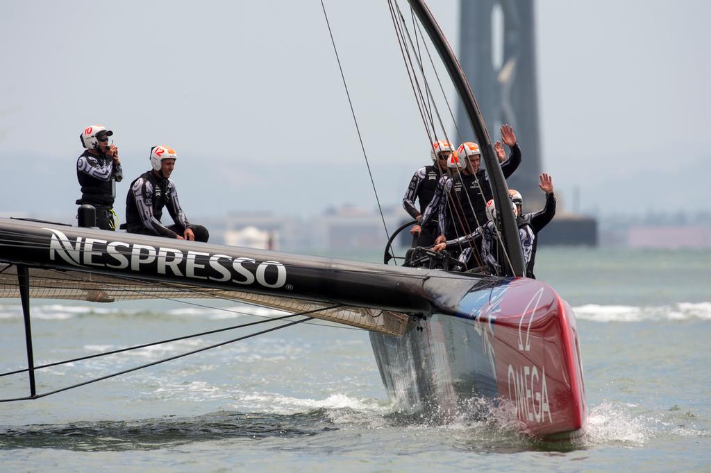 Emirates Team New Zealand wave to spectators after finishing their round robin 2 match of the Louis Vuitton Cup against Artemis Racing who were not sailing. 14/7/2013 photo copyright Chris Cameron/ETNZ http://www.chriscameron.co.nz taken at  and featuring the  class
