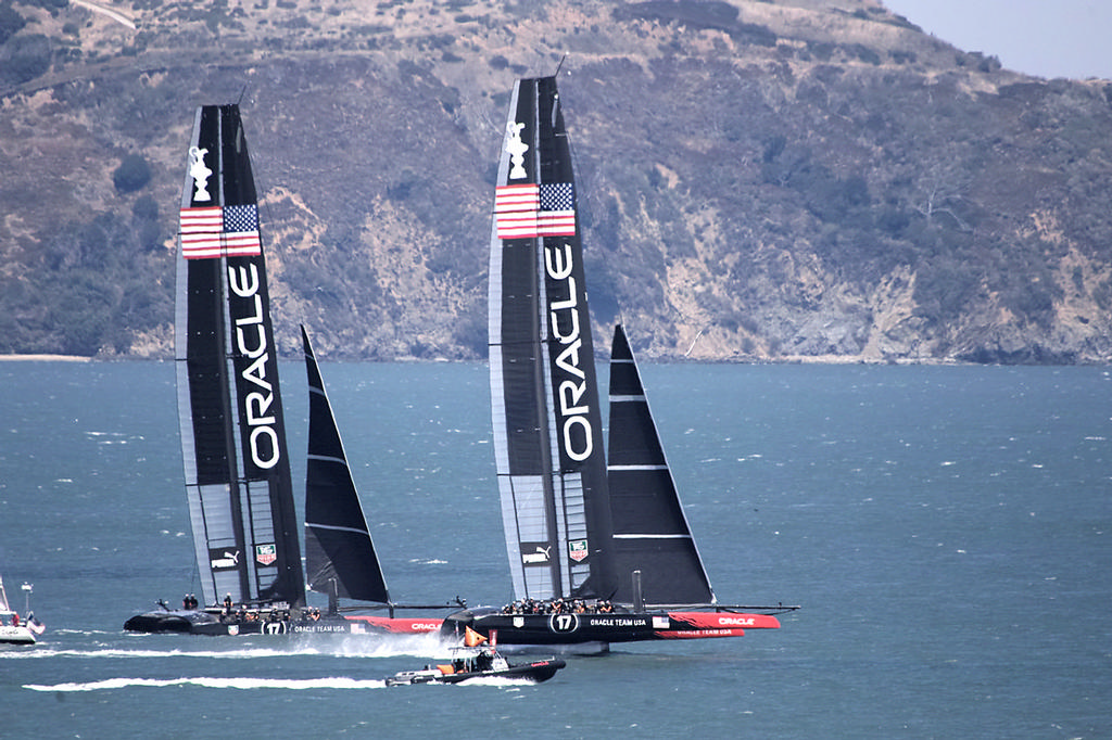 Both Oracle boats testing trim and speed against each other.  - America's Cup © Chuck Lantz http://www.ChuckLantz.com
