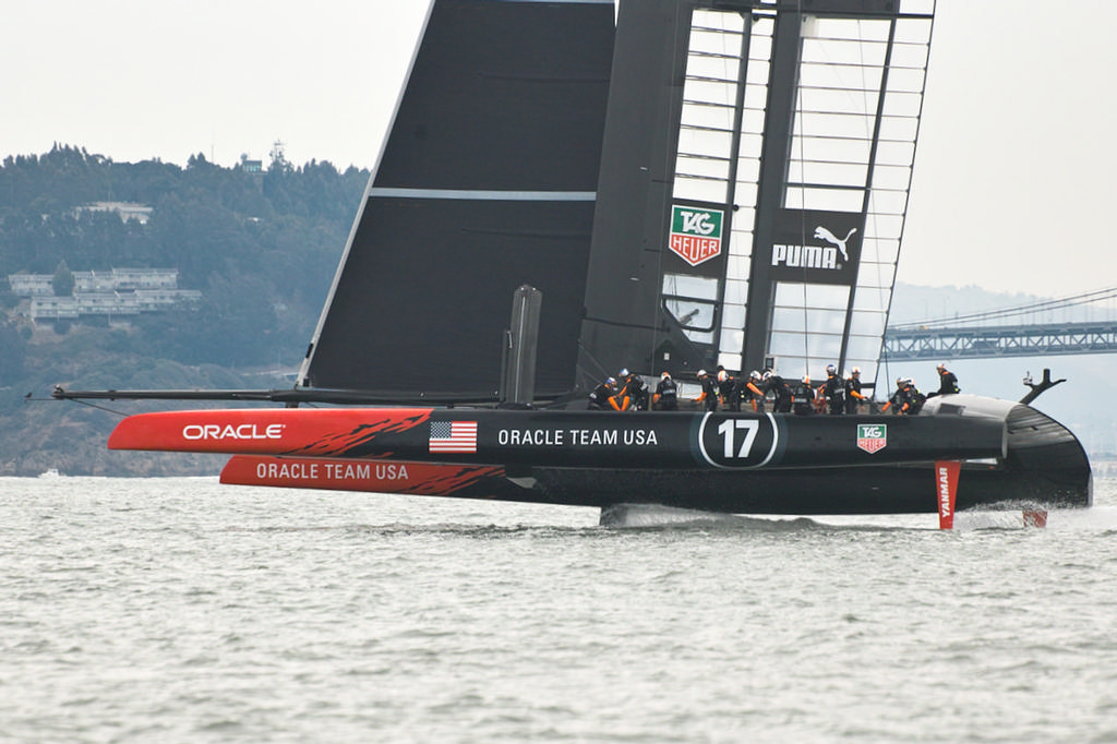 Oracle on port tack, showing cleaner a wake with less cavitation than in earlier sessions.  - America's Cup © Chuck Lantz http://www.ChuckLantz.com