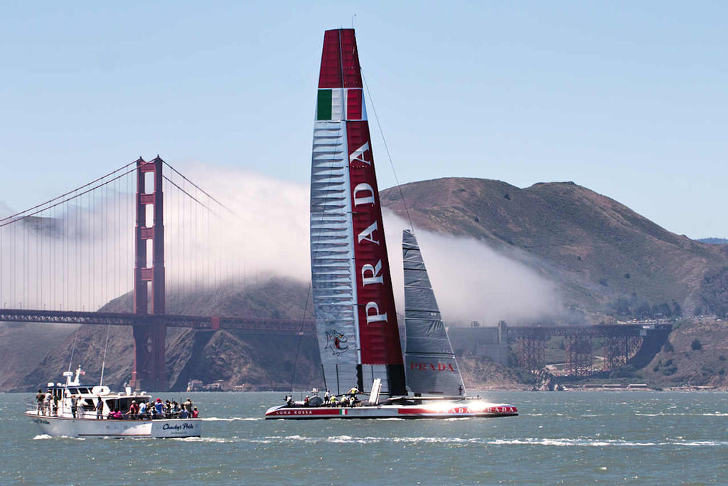 Luna Rossa shining silver livery with the iconic Golden Gate bridge in the background.  - America's Cup © Chuck Lantz http://www.ChuckLantz.com