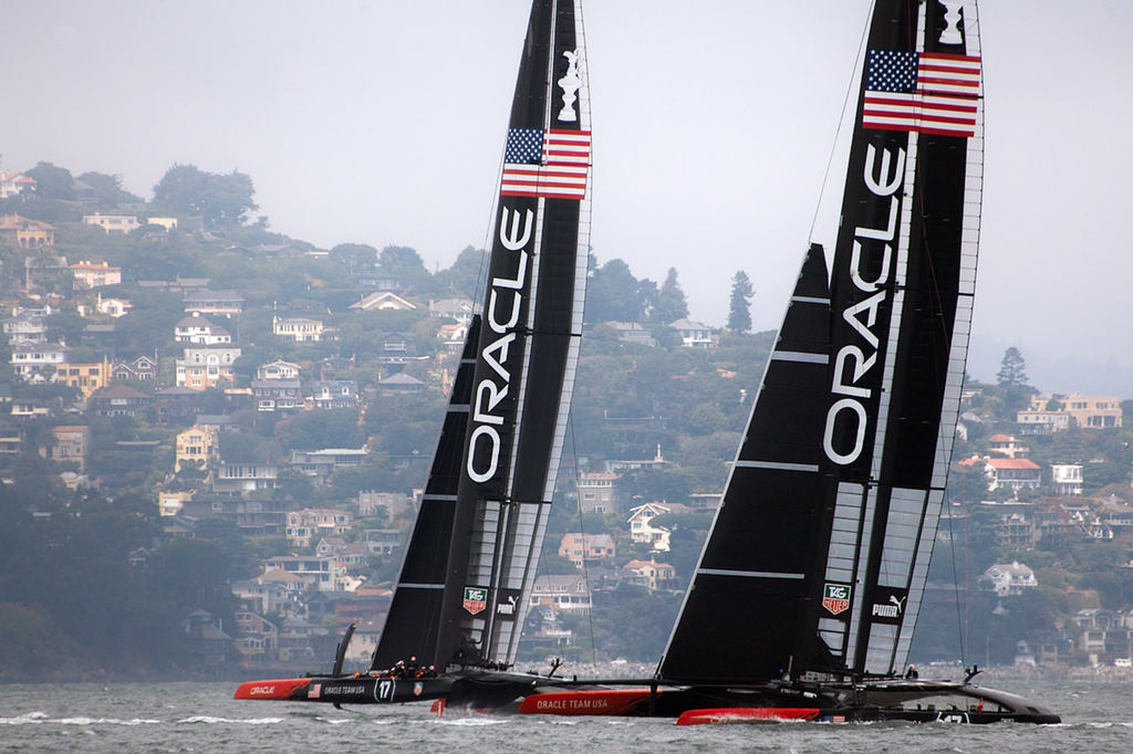 Oracle 1 and 2, with the hills of Marin County in the background - America's Cup photo copyright Chuck Lantz http://www.ChuckLantz.com taken at  and featuring the  class