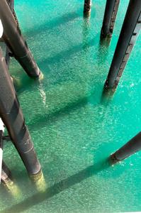 Thick schools of baitfish hanging around jetty pylons are a sure sign large, predatory fish will be lurking a jetty as well photo copyright Ben Knaggs taken at  and featuring the  class