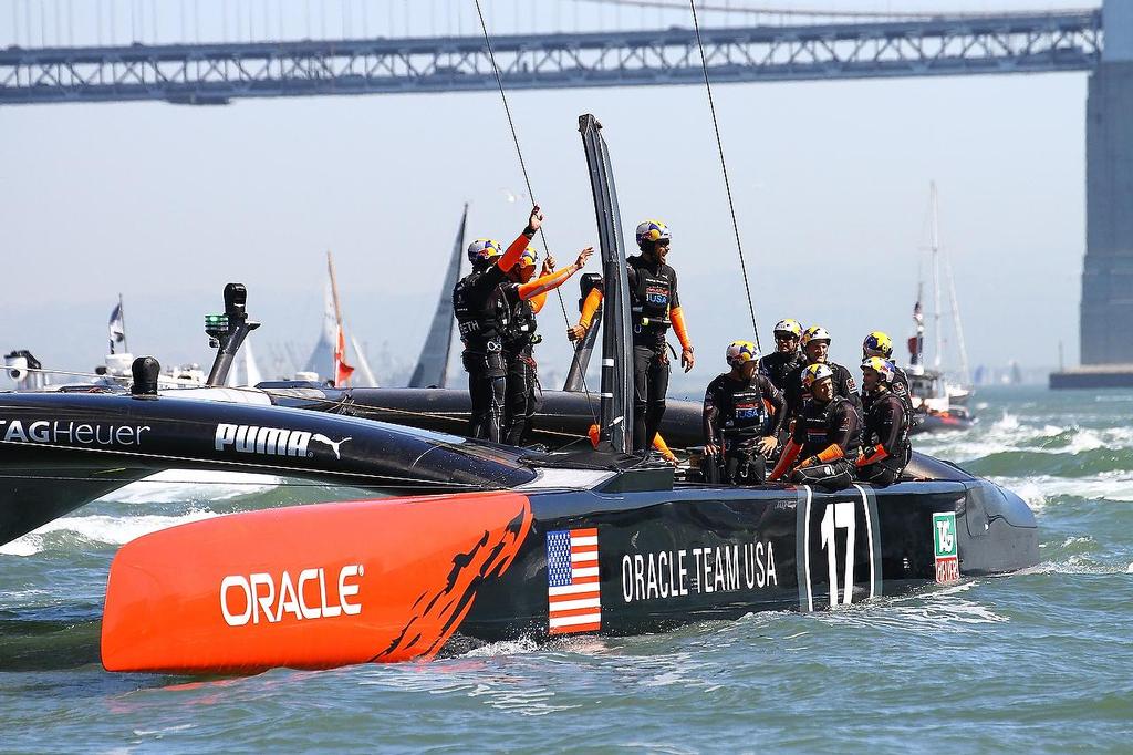 America’s Cup - Day 1,  Oracle Team USA vs Emirates Team NZ - Race 2 - Oracle Team USA salute their fans photo copyright Richard Gladwell www.photosport.co.nz taken at  and featuring the  class