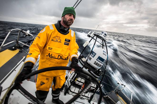 March 20,2015. Leg 5 to Itajai onboard Abu Dhabi Ocean Racing. Day 02. Ian Walker steers Azzam into the cold of the Southern Ocean. © Matt Knighton/Abu Dhabi Ocean Racing