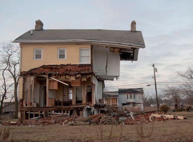 This Union Beach, NJ, home was destroyed by Hurricane Sandy storm tide in 2012. The inundation caused by Sandy caused tens of billions of dollars of damage related in large part to the large size of the storm, the coincidence of landfall with high tide, and the large population of humans in close proximity to the ocean. Historically and prehistorically, many storms of greater intensity than Sandy made landfall in the now densely populated northeast U.S. - Prehistoric-hurricanes © Richard Sullivan