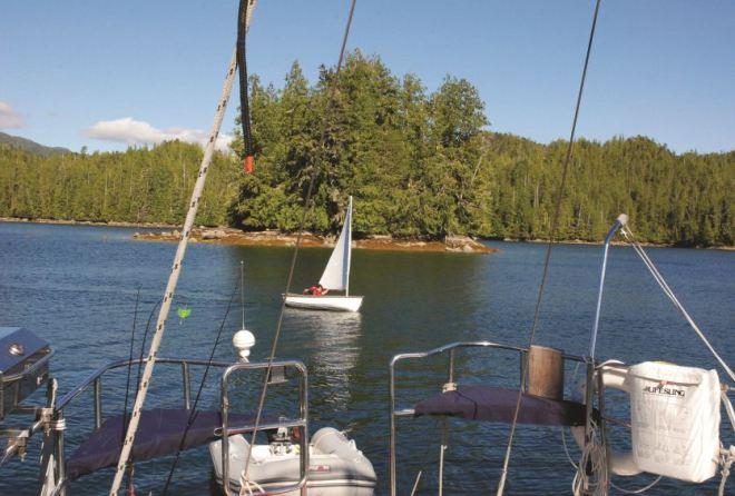 A light breeze in Kwakume Inlet provides perfect conditions for dinghy sailing. Ocean Cruise Guides - Kwakume Inlet, British Columbia © Anne Vipond and William Kelly