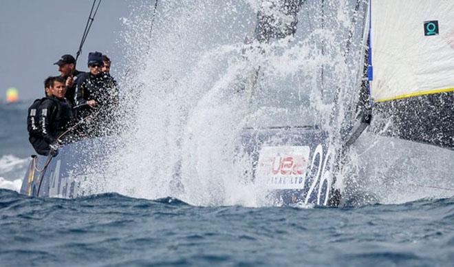 Artemis Racing plows through a giant wave downwind © MartinezStudio.es