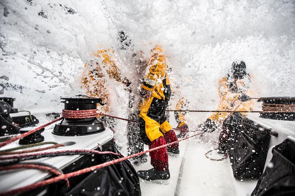 March 24, 2015. Leg 5 to Itajai onboard Abu Dhabi Ocean Racing. Day 06.  Louis Sinclair, Daryl Wislang, and Phil Harmer get the fire hydrant at eye level during a gybe in the Southern Ocean. © Matt Knighton/Abu Dhabi Ocean Racing